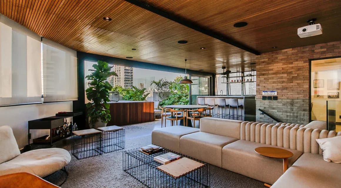 Modern living room with a slatted wood ceiling and beige sofa